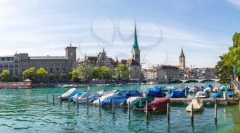Clock tower of the Fraumunster Cathedral in historical part of Zurich in a beautiful summer day, Switzerland