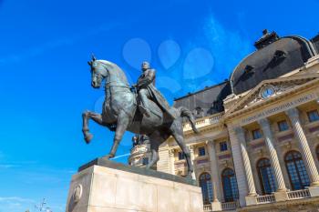 King Carol I statue and National Library in Bucharest, Romania in a beautiful summer day