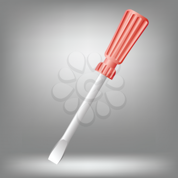 Single slotted screwdriver with plastic grip.  Red screwdriver on grey background.