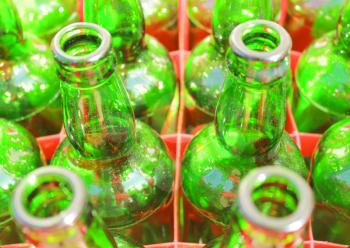 Beer Bottles of Green Glass.  Empty Green Bottlse in Box.