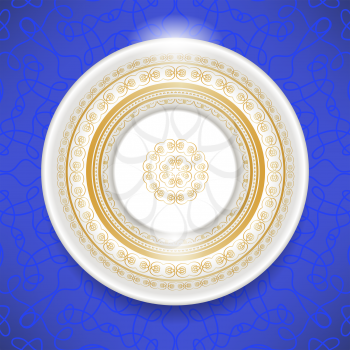 Ceramic Ornamental  Plate Isolated on Blue Background. Top View