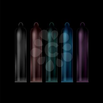 Set of Colored Condoms Isolated on Black Background