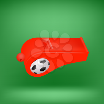 Red Footbal Whistle for Feferee on Green Soft Background