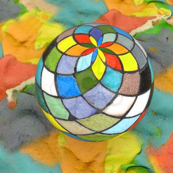 Mosaic ball on a colorful background