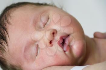 Image of sleeping beautiful cute newborn girl