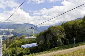 Pictureque landscape with empty funicular in green Caucasus mountains