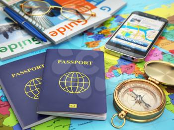Travel guide concept. Passport, compass, guide books, mobile phone on the world map. 3d
