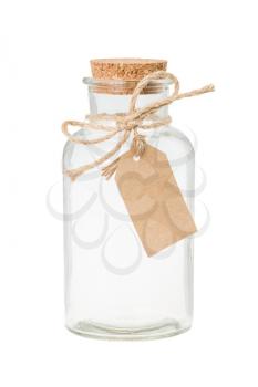 Empty vintage bottle with label and cork isolated on white