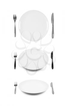 White plate with fork and knife. Isolated on white. Three angles of view.
