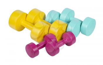 Three pairs of colorful dumbbells isolated on white