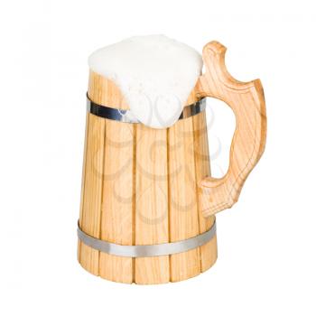 Wooden beer mug with beer isolated on white