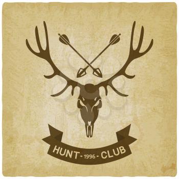 deer skull silhouette on crossed hunting arrows old background. hunting club design. vector illustration - eps 10