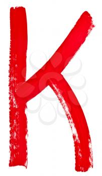 capital letter k hand painted by red brush on white background