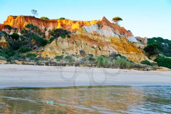 many-colored sand mountain in Algarve, Portugal