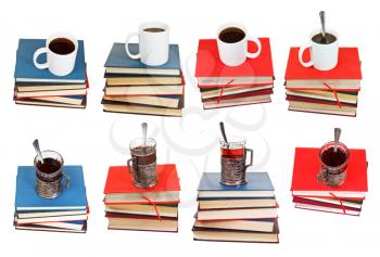 set from stacks of books with cup of coffee or tea on top isolated on white background