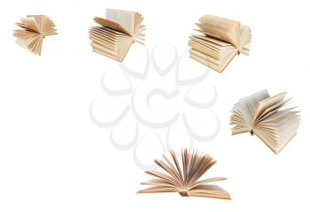 set from fanned old book isolated on white background