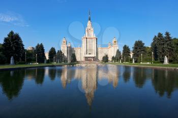 panoramic view of Lomonosov Moscow State University and fountain pond in summer day
