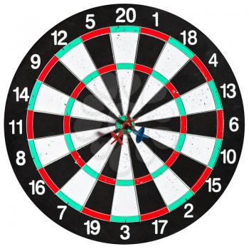 used dartboard with three darts isolated on white background