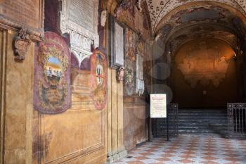 medieval wall, arcade and niche of Archiginnasio palace - the first official headquarter for the world oldest University of Bologna