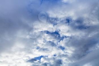 blue break between grey autumn clouds