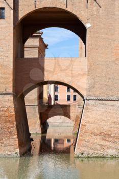 moat and bridges of Castle Estense in Ferrara, Italy