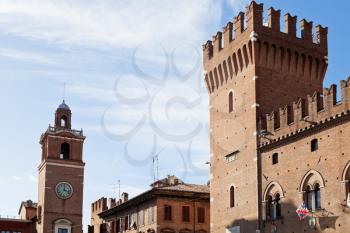 clock tower and ancient City Hall in Ferrara, Italy