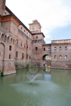 view of moat and castello estense in Ferrara, Italy