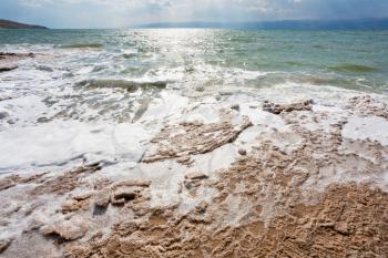 crystal salt beach on Dead Sea coast, Jordan
