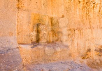 niche with ancient Nabatean god statue in wall of Siq gorge, Petra, Jordan