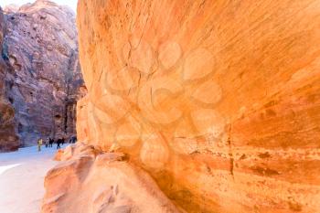 multicoloured sandstone walls of gorge Siq in Petra, Jordan