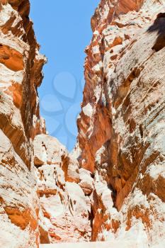 sand rock walls above gorge Siq in Petra, Jordan