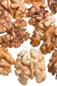 peeled walnut kernels isolated on white background close up