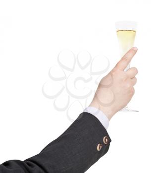 raising of champagne glass in businessman hand isolated on white background