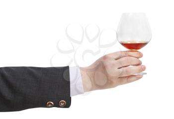 toast with brandy glass in businessman hand isolated on white background