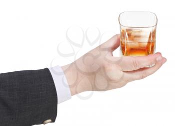 whiskey with ice glass in businessman hand isolated on white background