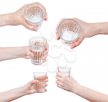 set of hand holds mineral water in glass isolated on white background