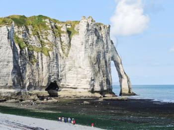 cliff with arch on english channel beach of etretat cote d'albatre, France