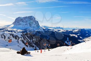 ski lift and view of Dolomites mountains in Val Gardena, Italy