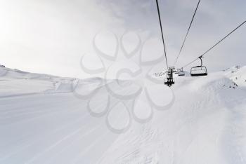 ski run and ski lift on snow slopes of mountains in Paradiski region, Val d'Isere - Tignes , France