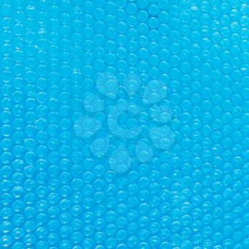blue texture of Bubble wrap on water close up