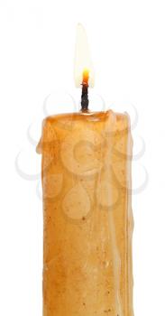 used burning candle close up isolated on white background