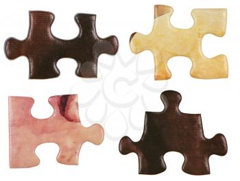 set of brown little puzzle pieces isolated on white background
