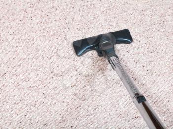 carpeting vacuuming with vacuum cleaner at home