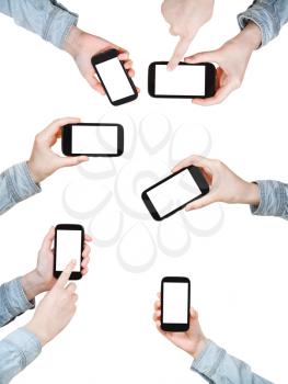 set of hands is shirt holding smart phones with cut out screen isolated on white background