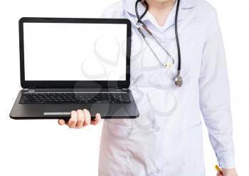 nurse holds computer laptop with cut out screen isolated on white background
