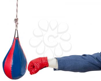 hand gesture - businessman with boxing glove punches punching bag isolated on white background