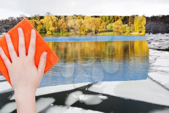 season concept - hand deletes ice floe in winter river by orange cloth from image and water and green woods are appearing