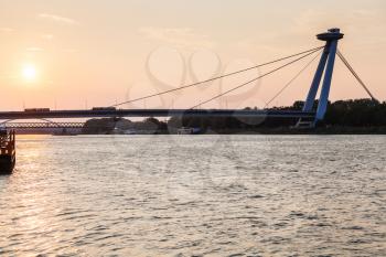 travel to Bratislava city - view of SNP bridge across Danube river in early morning