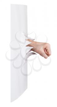 side view of the fist breaks a paper wall isolated on white background
