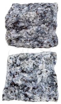 macro shooting of specimen natural rock - two pieces of Gabbro (basalt) mineral stone isolated on white background